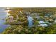 Aerial view showcasing home's waterfront location and canal access at 159 Danforth Dr, Punta Gorda, FL 33980