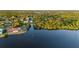 Aerial view showcasing waterfront property with canal access and dock at 159 Danforth Dr, Punta Gorda, FL 33980