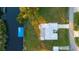Drone view of canal front home showcasing private backyard and dock at 159 Danforth Dr, Punta Gorda, FL 33980
