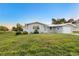 Single story home with attached garage and spacious lawn at 159 Danforth Dr, Punta Gorda, FL 33980