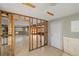 Home interior undergoing renovation, showing framing and new flooring at 159 Danforth Dr, Punta Gorda, FL 33980