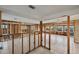 Tiled floor living area undergoing renovation with exposed framing at 159 Danforth Dr, Punta Gorda, FL 33980