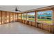 Sunroom with tiled floors and windows, currently under construction at 159 Danforth Dr, Punta Gorda, FL 33980