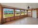 Under construction sunroom featuring tiled flooring and multiple windows at 159 Danforth Dr, Punta Gorda, FL 33980
