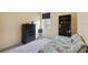 Bedroom with built-in shelving and a comfortable sleeping area at 16927 Melissa Ann Dr, Lutz, FL 33558