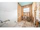 Bathroom under construction, framing and plumbing visible at 1820 Sutherland W Dr, Palm Harbor, FL 34683