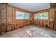 Unfinished bedroom with exposed framing at 1820 Sutherland W Dr, Palm Harbor, FL 34683