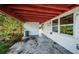 Covered patio area with concrete flooring at 1820 Sutherland W Dr, Palm Harbor, FL 34683