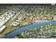 Aerial view of a large apartment community near a river at 1904 W Saint Louis St, Tampa, FL 33607