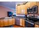 Modern kitchen with stainless steel appliances and ample cabinetry at 21012 Picasso Ct # J205, Land O Lakes, FL 34637