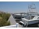 Boat docks with several boats at a waterfront community at 25 Harborpointe Dr, Port Richey, FL 34668