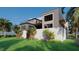 Stylish home with gray exterior and a large backyard at 25 Harborpointe Dr, Port Richey, FL 34668