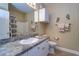 Clean bathroom with single vanity and shower/tub combo at 2749 Via Cipriani # 1010B, Clearwater, FL 33764