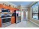 Bright kitchen with stainless steel appliances and granite countertops at 2749 Via Cipriani # 1010B, Clearwater, FL 33764