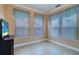 Bright office space with three windows and neutral walls at 2749 Via Cipriani # 1010B, Clearwater, FL 33764
