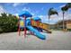 playground with a slide and climbing structures at 2749 Via Cipriani # 1010B, Clearwater, FL 33764
