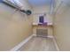 Large walk-in closet with shelving and a safe at 2749 Via Cipriani # 1010B, Clearwater, FL 33764