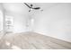Bedroom with ceiling fan, vinyl plank flooring, and access to bathroom at 2859 38Th N Ave, St Petersburg, FL 33713