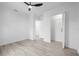 Bright bedroom with wood-look floors and ceiling fan at 2859 38Th N Ave, St Petersburg, FL 33713