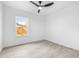 Bright bedroom with window and ceiling fan at 2859 38Th N Ave, St Petersburg, FL 33713