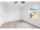 Charming bedroom with a window and wood-look floors at 2859 38Th N Ave, St Petersburg, FL 33713