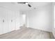 Well-lit bedroom with double doors and ceiling fan at 2859 38Th N Ave, St Petersburg, FL 33713