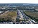 Aerial view of townhouses and surrounding area, showcasing the community's location and landscape at 3122 Victoria Inlet Dr, Holiday, FL 34691