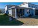 Screened patio with telescope and yard at 3122 Victoria Inlet Dr, Holiday, FL 34691