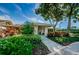 Landscaped entrance to the community building at 3541 Oak Lake Dr, Palm Harbor, FL 34684