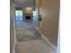 Entryway with view to living room and fireplace at 3558 Indigo Pond Dr # 10, Palm Harbor, FL 34684