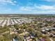 Neighborhood with various homes and a lake at 3724 15Th Se Ave, Largo, FL 33771