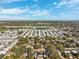 Aerial view of neighborhood and lake at 3724 15Th Se Ave, Largo, FL 33771