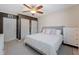 Main bedroom with a king bed, ceiling fan and large closet at 3724 15Th Se Ave, Largo, FL 33771
