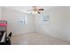 Bright bedroom with tile floors and ceiling fan at 3724 15Th Se Ave, Largo, FL 33771