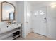Bright entryway with a console table and mirror at 3724 15Th Se Ave, Largo, FL 33771
