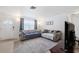 Living room with gray couch and patterned rug at 3724 15Th Se Ave, Largo, FL 33771