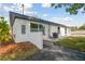 View of backyard with AC unit and small patio at 3815 N 14Th St, Tampa, FL 33603