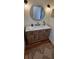 Elegant bathroom with a large vanity mirror and modern fixtures at 4514 Dewey Dr, New Port Richey, FL 34652