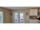 Kitchen with French doors leading to a patio at 4514 Dewey Dr, New Port Richey, FL 34652