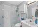 Clean bathroom with a walk-in shower, white tile, and a vanity at 4531 Swordfish Dr, Bradenton, FL 34208