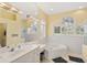 Bathroom features a large soaking tub, walk-in shower, and dual sinks at 4531 Swordfish Dr, Bradenton, FL 34208