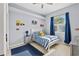 bedroom with striped bedding and playful decor at 4531 Swordfish Dr, Bradenton, FL 34208