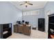 Private office with wood desk, ample storage, and safety deposit box at 4531 Swordfish Dr, Bradenton, FL 34208