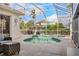 Inviting pool and spa area with covered patio at 4531 Swordfish Dr, Bradenton, FL 34208