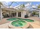 Large pool and spa with covered patio and grill at 4531 Swordfish Dr, Bradenton, FL 34208