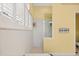 Walk-in shower with glass enclosure and built-in shelving at 4531 Swordfish Dr, Bradenton, FL 34208