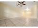 Spacious living room with tile floors and ceiling fan at 5221 Bayshore Blvd # 37, Tampa, FL 33611