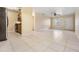Open living room and kitchen area with tile floors at 5221 Bayshore Blvd # 37, Tampa, FL 33611