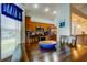 Small dining area with wood table and chairs and a view into kitchen at 531 Canal Way, Oldsmar, FL 34677