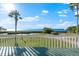 Spacious deck overlooks the water with stunning views at 555 Gulf Dr, Crystal Beach, FL 34681